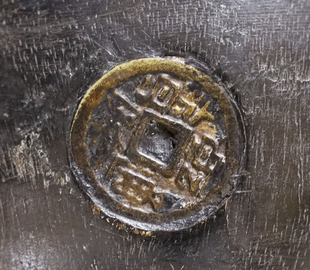 Metalware to include - a Sino-Tibetan bronze amulet, a Bidri ware dish, a Chinese paktong handwarmer Asian wood balls with inset coins etc